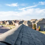 ridge view of residential rooftop after repairs